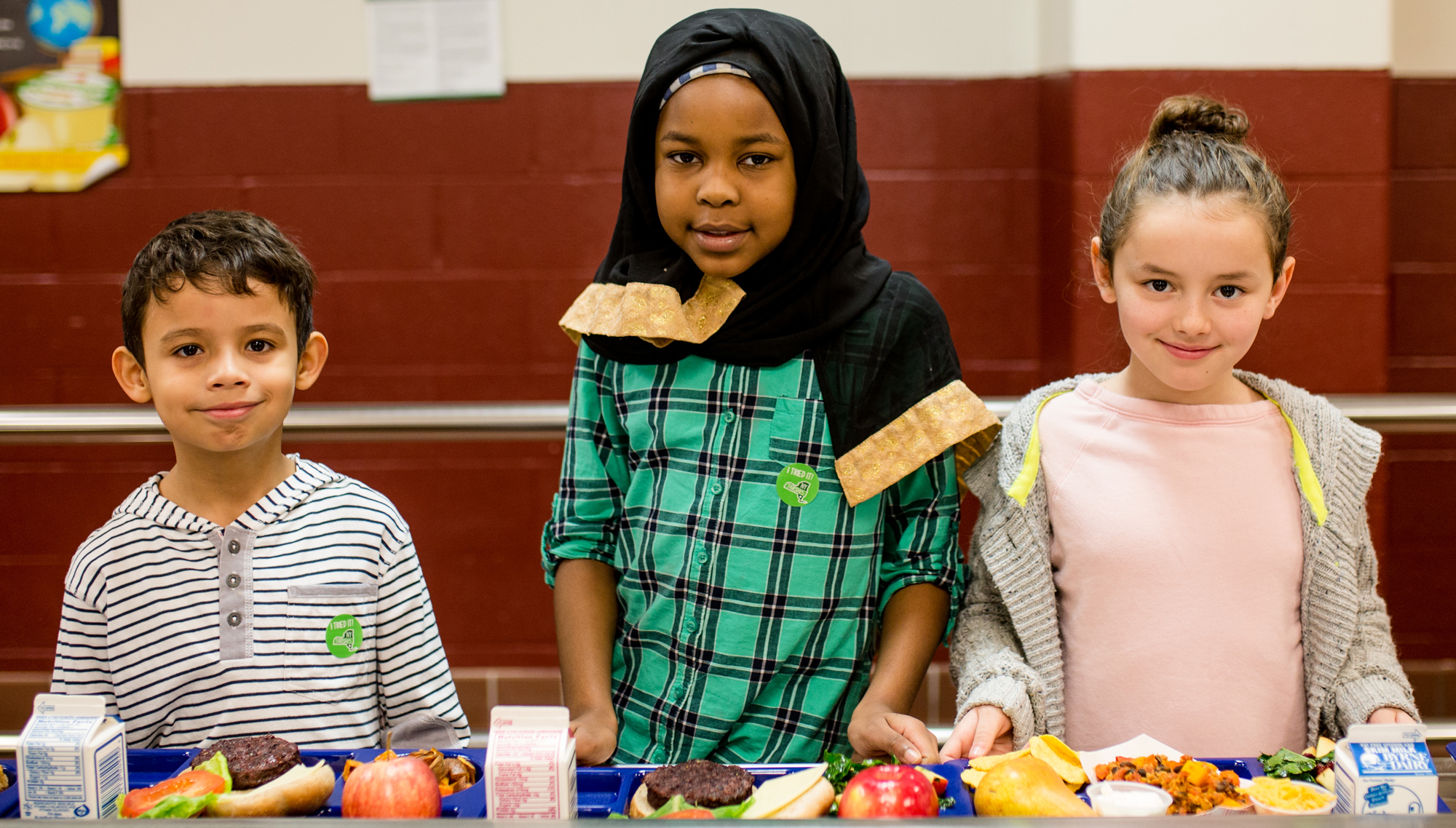 kids in school cafeteria lunch line